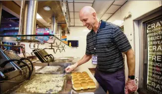  ?? COURTESY OF WHITE CASTLE ?? Oberle makes sliders at the 2021 White Castle Craver Hall of Fame induction in May.