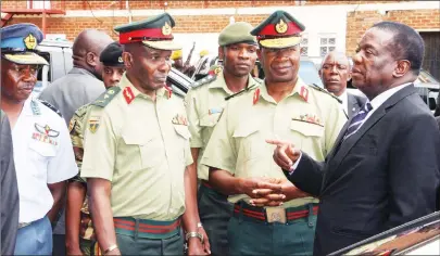  ?? — Picture by Tawanda Mudimu ?? President Mnangagwa speaks to Zimbabwe Defence Forces Commander General Philip Valerio Sibanda (second right) while Zimbabwe National Army Commander Lieutenant-General Edzayi Chimonyo (second left) and Commander Air Force of Zimbabwe Air Marshal Elson...