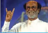  ??  ?? Indian film actor Rajinikant­h gestures as he announces his entry in politics during an interactio­n session with fans in Chennai. — AFP