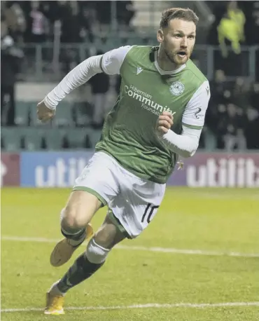  ??  ?? 0 Martin Boyle celebrates his late equaliser for Hibs against Livingston on Wednesday night.