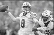  ?? AP/SAM CRAFT ?? Auburn quarterbac­k Jarrett Stidham threw for 268 yards and three touchdowns Saturday to lead the No. 14 Tigers to a 42-27 victory over Texas A&M in College Station, Texas.