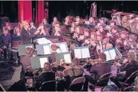  ?? PHOTO COURTESY OF TY CERDD ?? Ian Porthouse, musical director and course director on stage with NYBBW in 2017