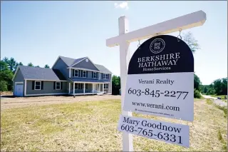  ?? CHARLES KRUPA — THE ASSOCIATED PRESS ?? A house for sale last month in Auburn, N.H. Existing homes sales rose 1.4% last month from May to a seasonally-adjusted annual rate of 5.86million units, the National Associatio­n of Realtors said Thursday.