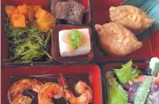  ?? KAREN PETERSON/JOURNAL ?? The bento box lunch with shrimp at Izanami is the perfect union of food and design.