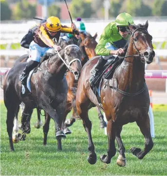  ?? ON SONG: Royal Symphony ( right), ridden by Dwayne Dunn, wins at Flemington last month. ??