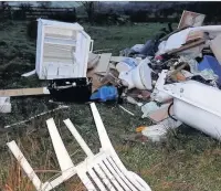  ?? Fly-tipped waste dumped on farm land ??