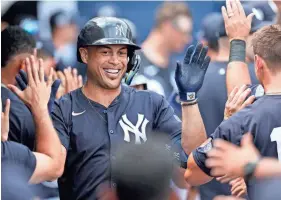  ?? NATHAN RAY SEEBECK/USA TODAY SPORTS ?? New York Yankees right fielder Giancarlo Stanton celebrates after hitting a home run against the Toronto Blue Jays on Saturday.