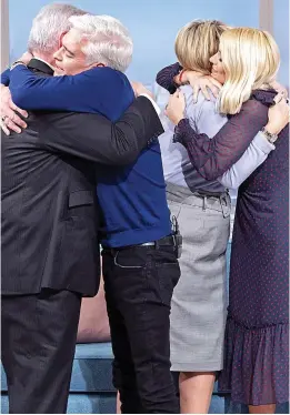  ??  ?? Hugs all round: The four ITV presenters embrace