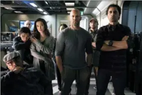  ?? WARNER BROS. PICTURES ?? Page Kennedy, foreground left, Ruby Rose, Li Bingbing, Jason Statham and Cliff Curtis appear in a scene from the “The Meg.”