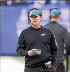  ?? JOHN BLAINE — SPECIAL TO THE TIMES ?? Pat Shurmur calls a play while filling in for the fired Chip Kelly as the Eagles’ interim coach for Sunday’s season finale against the Giants at MetLife Stadium. Shurmer and the Eagles pulled out a 35-30victory and Shurmur, who has been a head coach in...