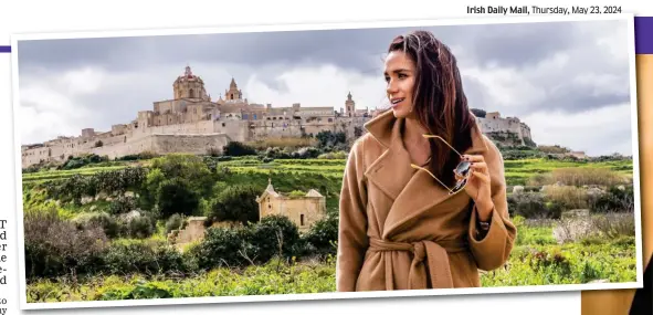  ?? ?? Cultural harvest: Wearing her favourite Max Mara coat, Meghan visits a vineyard in the Maltese town of Mdina