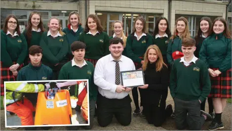  ??  ?? Student Jack Ryan on behalf of Gorey Community School’s 6th year Geography class accepts the Dublin Institute for Advanced Studies certificat­e from class teacher Catherine O’Brien. INSET: the seismoter ‘Harry’ which was named by the Gorey students.