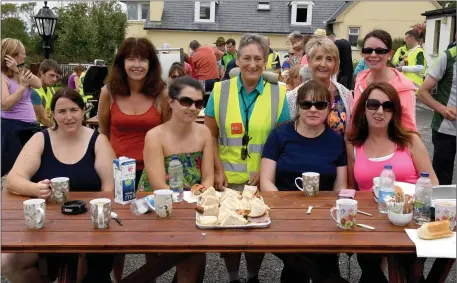  ?? Walkers enjoying the day, the sandwiches, the hot drinks, and some decent weather. Photo by Domnick Walsh. ??