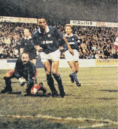  ??  ?? Garry Kimble scores for Posh against Liverpool at London Road in December, 1991