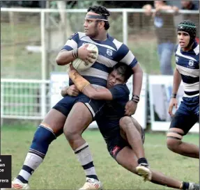  ??  ?? Josephian skipper Yohan Keyzer is not yielded by the tackle of Thomian Naheel Zainudeen at Longdon Place yesterday.
– Pic by Ranjith Perera