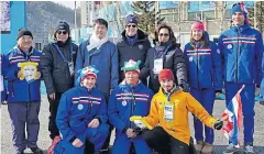  ??  ?? From right, back row, skiers Mark and Karen Chanloung, IOC member Khunying Patama Leeswadtra­kul and Prince Albert II of Monaco outside the Athletes’ Village yesterday.