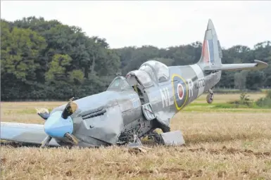  ??  ?? A picture of the damaged Spitfire taken by witness Liz King