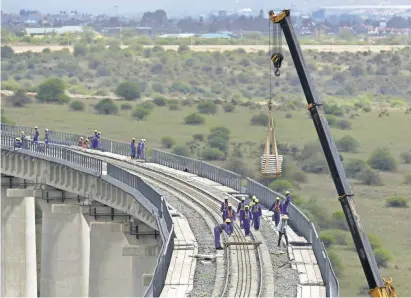  ?? BEN CURTIS, AP ?? China is the driving force for a $ 13.8 billion, 300- mile railway project through the heart of Kenya in East Africa.