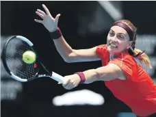  ?? AP; Getty ?? Angelique Kerber, top, took time to settle down before winning past Camila Giorgi. Petra Kvitova, above, beat the in-form Aryna Sabalenka to avenge her US Open defeat last year