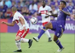  ?? ORLANDO SENTINEL FILE PHOTO ?? Cyle Larin, right, will return to Canada’s lineup to play Jamaica on Thursday night.