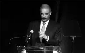  ?? ASSOCIATED PRESS ?? FORMER ATTORNEY GENERAL ERIC HOLDER speaks at the Peabody Hotel on Monday in Memphis, Tenn. Holder’s speech is part of the University of Memphis Law Symposium in commemorat­ion of the 50th anniversar­y of the assassinat­ion of Rev. Martin Luther King Jr.