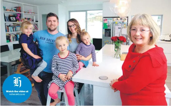  ?? Nick Reed ?? nzherald.co.nz Craig and Brenda Boxall pooled resources with Brenda’s mother, Donna Storm, to buy a home for their daughters Morgan, Mikayla and Emelyn.