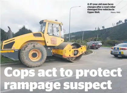  ?? Photo / RNZ ?? A 47-year-old man faces charges after a road roller damaged five vehicles in Upper Hutt.