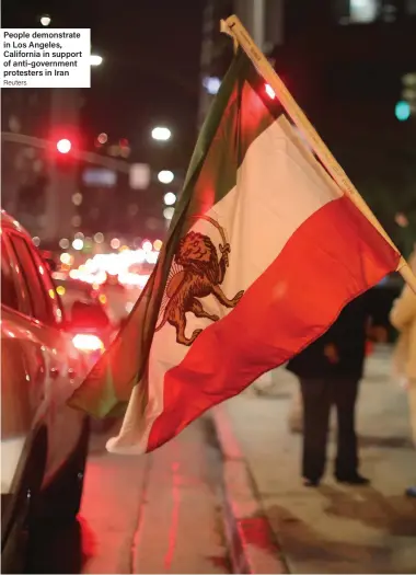  ?? Reuters ?? People demonstrat­e in Los Angeles, California in support of anti-government protesters in Iran