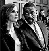  ?? STX ENTERTAINM­ENT ?? Jessica Chastain and Idris Elba star in “Molly’s Game,” about the rise and fall of an undergroun­d poker empire.