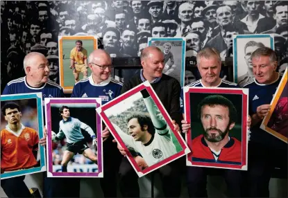  ??  ?? Members of an Edinburgh-based autism support club show off some of the best players from the past 30 years of European football that will form part of a new exhibition at the Scottish Football Museum. The event marked 100 days to go until the Euro 2020 finals kick off