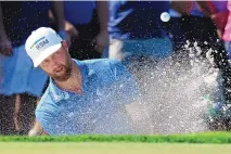  ?? LYNNE SLADSKY/ASSOCIATED PRESS ?? Chris Kirk hits from a bunker onto the green during the final round of the Honda Classic on Sunday. Kirk’s tap-in birdie on the first hole of a playoff between him and Eric Cole sealed his first win in eight years.