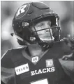  ?? CANADIAN PRESS FILE PHOTO ?? Ottawa Redblacks quarterbac­k Trevor Harris opted to re-sign for one year.