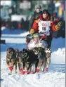  ?? MICHAEL DINNEEN / ASSOCIATED PRESS ?? Iditarod veteran Mitch Seavey, who won this year’s race in record time, takes part in the ceremonial start of the Iditarod Trail Sled Dog Race in Anchorage, Alaska.