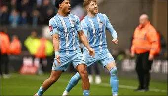  ?? Photo: AFP ?? Coventry’s Milan van Ewijk (left) and Josh Eccles celebrate their historic FA Cup semi-final win against Wolves last Saturday (Mar 16).