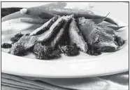  ?? Chicago Tribune/TNS/ZBIGNIEW BZDAK ?? A sauce of sauteed shallots, butter and red wine dresses panfried duck breast.