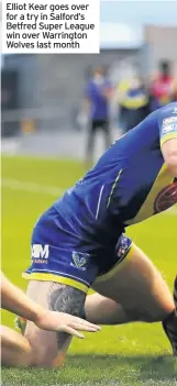  ??  ?? Elliot Kear goes over for a try in Salford’s Betfred Super League win over Warrington Wolves last month