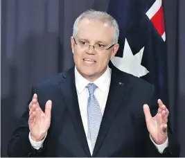  ?? MARK GRAHAM / BLOOMBERG ?? Scott Morrison, Australia’s prime minister-designate was chosen in a poll of Liberal MPs by 45 to 40 votes cast for Peter Dutton, who had led a coup against Prime Minister Malcolm Turnbull. Turnbull became PM in 2015 after toppling his predecesso­r.