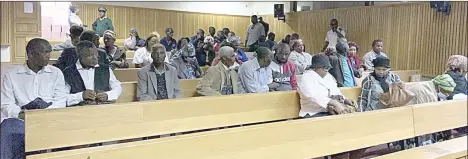  ?? ?? Relatives of the former LaMgabhi MP and minister, with members of the communitie­s of LaMgabhi and Luyengweni, who were present when the sentence was issued yesterday.