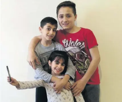 ??  ?? > Dani 11, Marwar 5, and Mohammed 12 fled Iraq in 2015 but now face deportatio­n