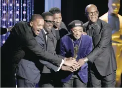  ??  ?? From left, Will Smith, Wesley Snipes, Denzel Washington, Spike Lee, honorary Oscar recipient, and Samuel L Jackson pose onstage.
