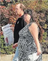  ?? CLIFFORD SKARSTEDT EXAMINER FILE PHOTO ?? David and Catherine Tuck, co-founders of the Peterborou­gh Huskies hockey team for children with special needs, leave Peterborou­gh Ontario Court of Justice on fraud charges after being released on Nov. 3, 2016.