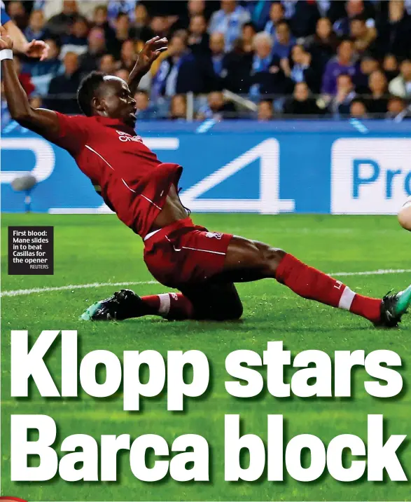  ?? REUTERS ?? First blood: Mane slides in to beat Casillas for the opener