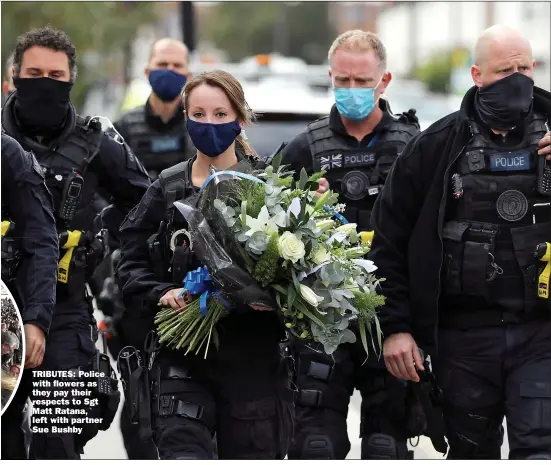  ?? Picture: SIMON DAWSON/REUTERS ?? TRIBUTES: T Police with flowers as they pay their respects to Sgt Matt Ratana, left with partner Sue S Bushby