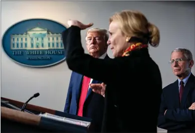  ?? ERIN SCHAFF — THE NEW YORK TIMES ?? President Donald Trump and Dr. Anthony Fauci, director of the National Institute of Allergy and Infectious Diseases, listen to White House coronaviru­s response coordinato­r Dr. Deborah Birx speak at a news conference on March 31.