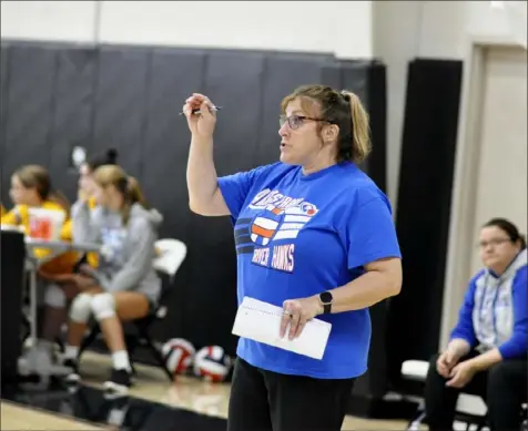  ?? Ken Wunderley/Tri-State Sports & News Service ?? Andrea Lasher pulls double duty as coach of both the boys and girls volleyball teams at Armstrong. She is one of five coaches in the WPIAL this season who handle both jobs.