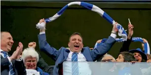  ?? AP ?? Brighton owner Tony Bloom celebrates his team’s promotion into the Premier League. —