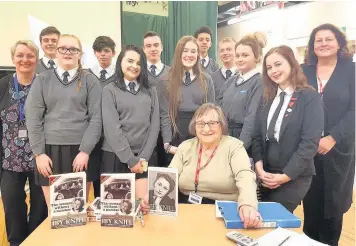  ??  ?? Holocaust survivor Iby Knill with pupils and staff at Rhyddings Business and Enterprise School