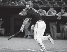  ?? Eric Christian Smith / Contributo­r ?? Houston’s Joe Davis watches the flight of his three-run homer off Northweste­rn State’s Kyle Swanson in the sixth inning.