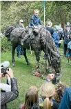  ?? PHOTO: MARK TAYLOR/STUFF ?? When the war horse statue was unveiled in Memorial Park on Saturday, Mattias Tafto, 8, was first up. His great-greatgrand­father was in the Wellington Mounted Rifles and served in WWI.