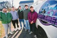  ?? Brian A. Pounds/ Hearst Connecticu­t Media ?? From left; recent garduates of Foran High School in Milford Dilahn Isaku, Shawn Gaul, Alex Moreno, Travis Gentley, and Tyler Borer have launched their newest business, Junk Gone, in Milford.